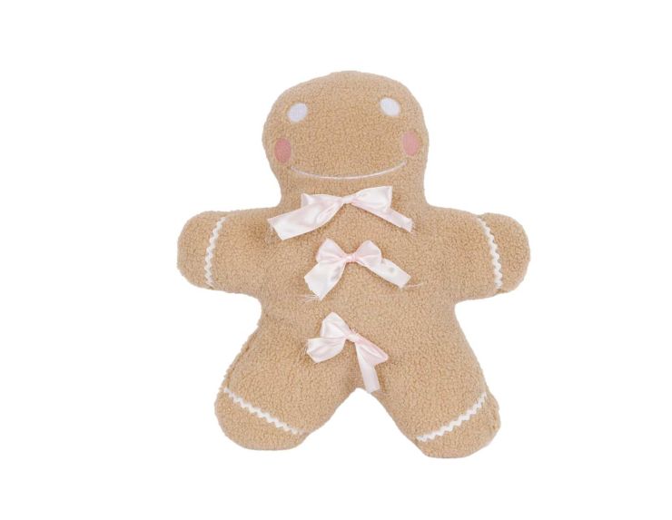 Coussin de Noël pain d’épice beige et noeuds rose.
