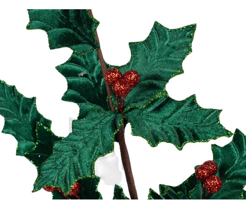 Branche de houx décorative de 80 cm aux feuilles vertes en velours et aux baies rouges scintillantes.