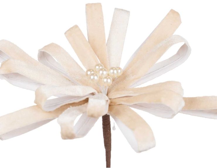 Fleur bow crème en velours doux, ornée de perles nacrées.