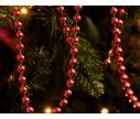 See slide Guirlande perles rouges 8 cm x 10 m