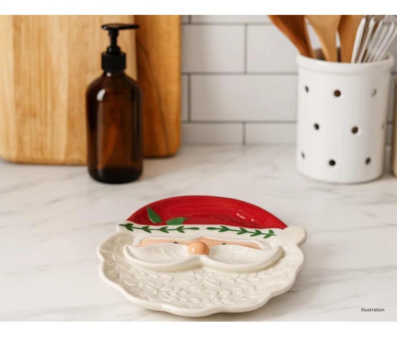 Plat céramique blanc rouge forme visage Père Noël bonnet rouge barbe blanche relief houx H29cm