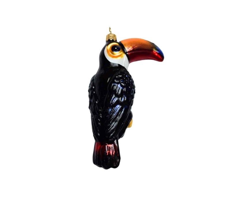 Suspension toucan en verre soufflé, peinte à la main. Hauteur : 14 cm.