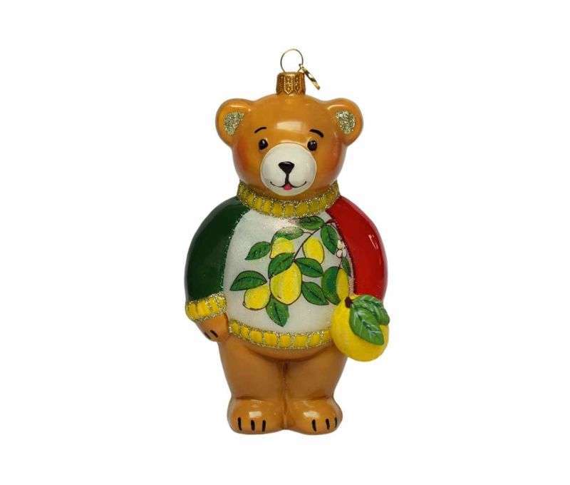 Suspension de Noël en verre soufflé représentant un ourson italien avec finition luxe façon porcelaine. Hauteur : 18 cm.