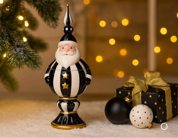 Bonbonnière décorative en céramique en forme de Père Noël noir et blanc. Hauteur : 47 cm.