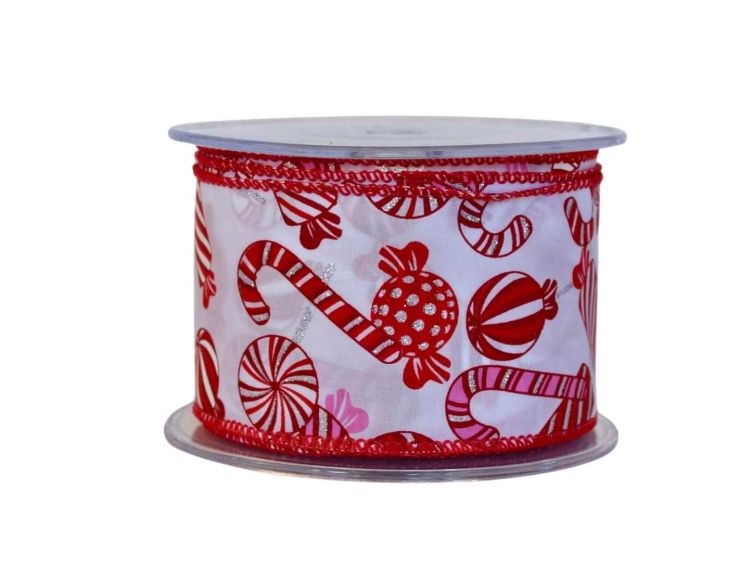 Ruban blanc décoré de bonbons rouges et roses pailletés. Largeur 7cm, longueur 9m