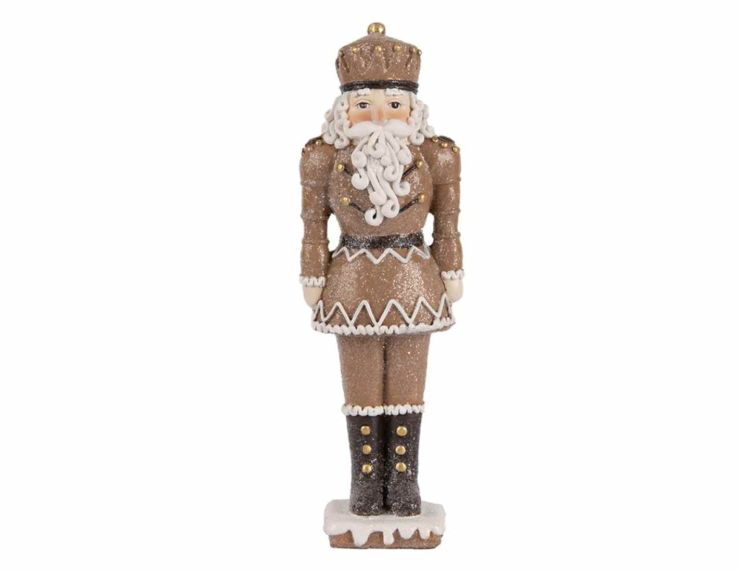 Casse-noisette en résine effet pain d’épice, détails givrés blancs. Hauteur : 18 cm.