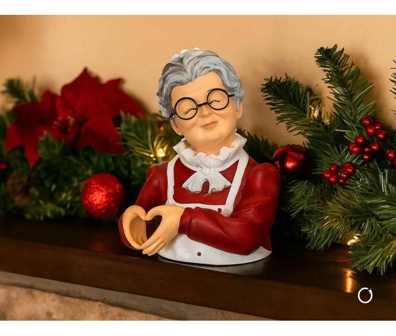 Décoration de Noël Mère Noël en résine formant un cœur avec les mains, hauteur 22 cm.