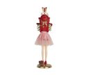 Voir la slide Figurine fille H36cm jupe rose scintillante, souliers rouges, pile de cadeaux Noël colorés sur la tête