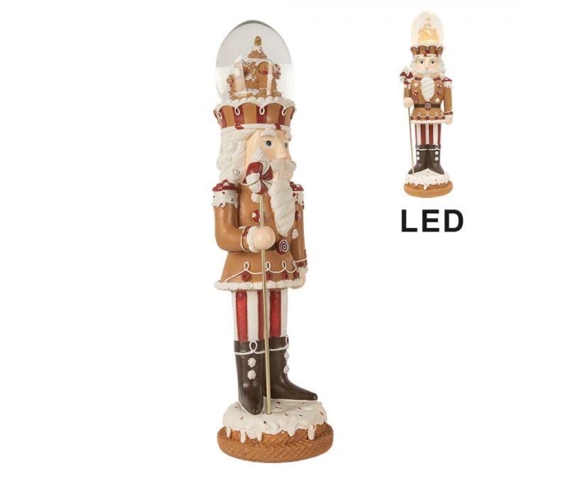 Casse-noisette pain d’épices H48cm résine, LED et musical, boule lumineuse sur tête, bonbons et sucre d’orge