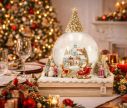 Voir la slide Boule à neige Noël village Père Noël traineau sapin doré socle livre LED H22cm - Lilosquare